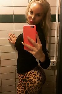 a mature woman taking cock in the ass and sitting on it